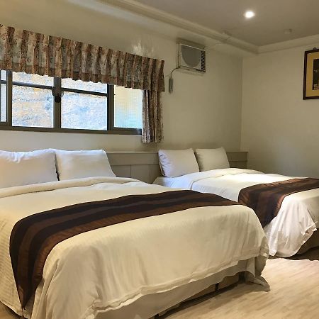 Minren Hotel Yuchi Bagian luar foto