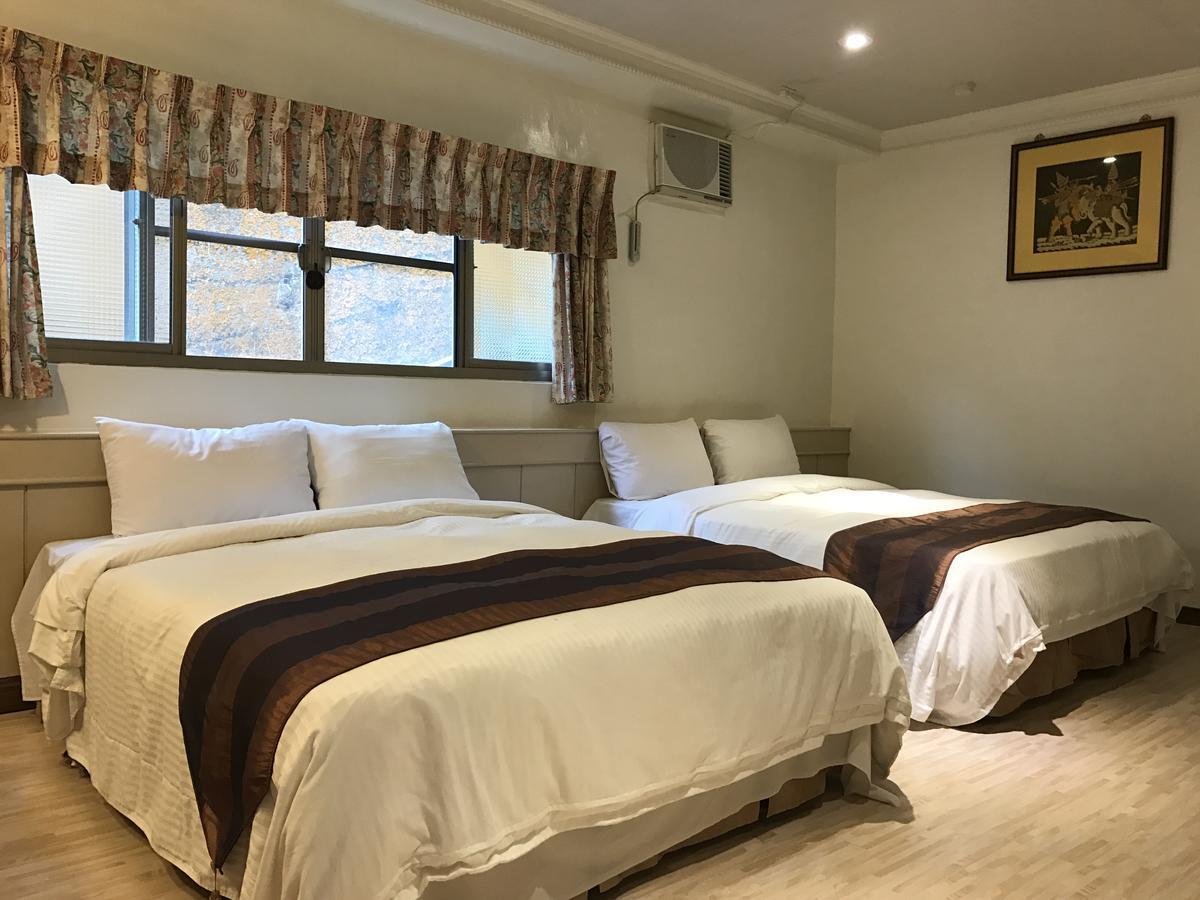 Minren Hotel Yuchi Bagian luar foto