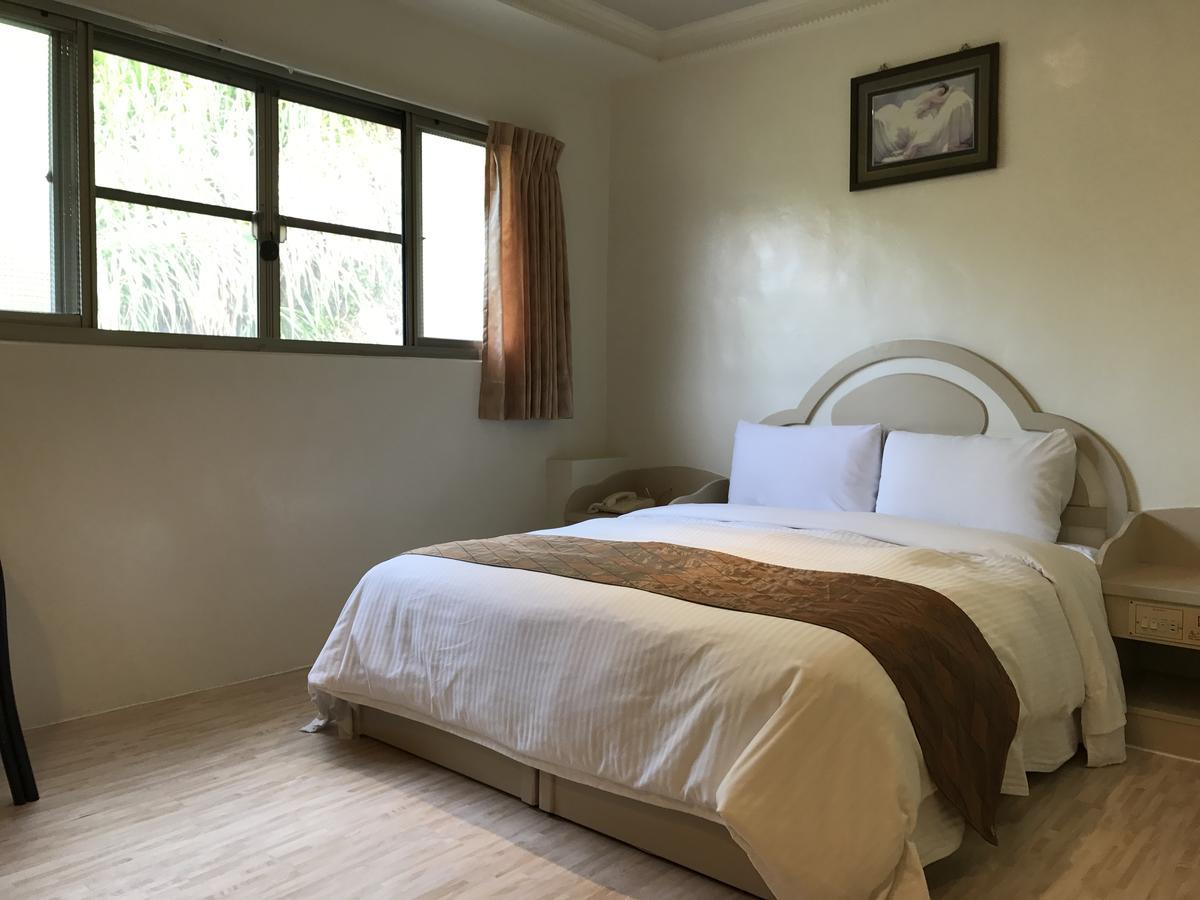 Minren Hotel Yuchi Bagian luar foto