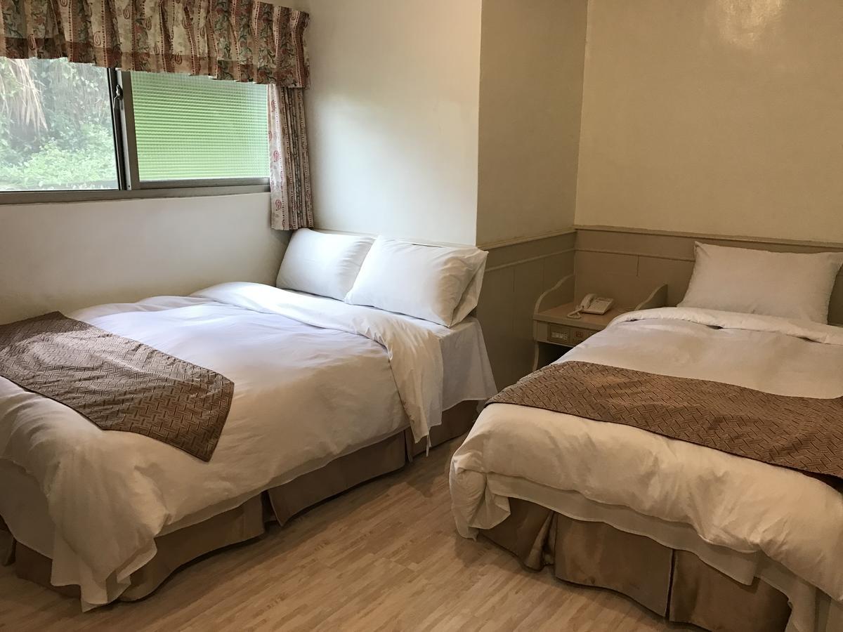 Minren Hotel Yuchi Bagian luar foto